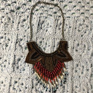 Beaded collar necklace.